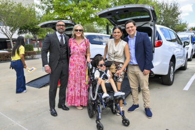 An image for the Houston Children's Charity Chariots for Children van distribution day where a record 98 wheelchair equipped vans were distributed at the Post Oak Hotel in Houston, TX on March 23, 2026.