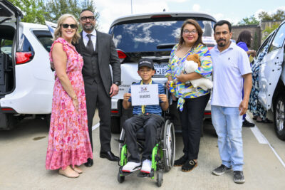 An image for the Houston Children's Charity Chariots for Children van distribution day where a record 98 wheelchair equipped vans were distributed at the Post Oak Hotel in Houston, TX on March 23, 2026.